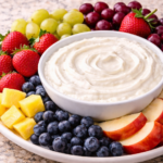 3-ingredient cream cheese fruit dip on a plate of fruit